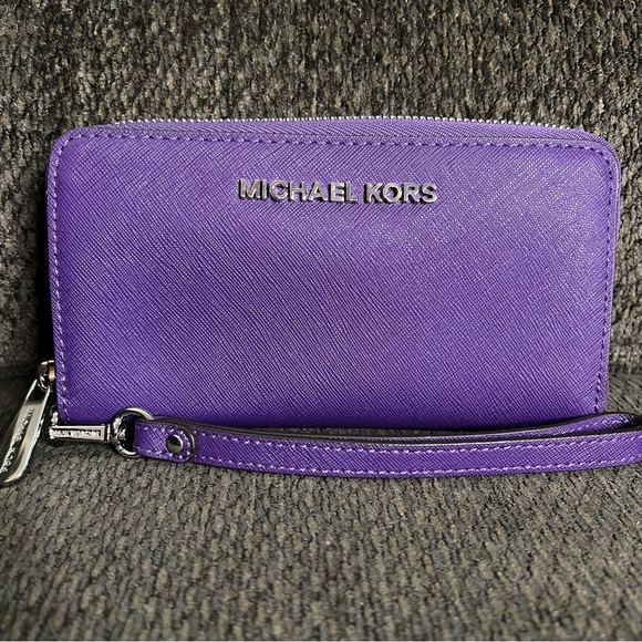 Michael Kors Handbags - NWOT Michael Kors Purple Zip Around Wristlet Wallet